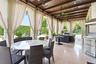 Large Patio by bar/game room with Summer Kitchen