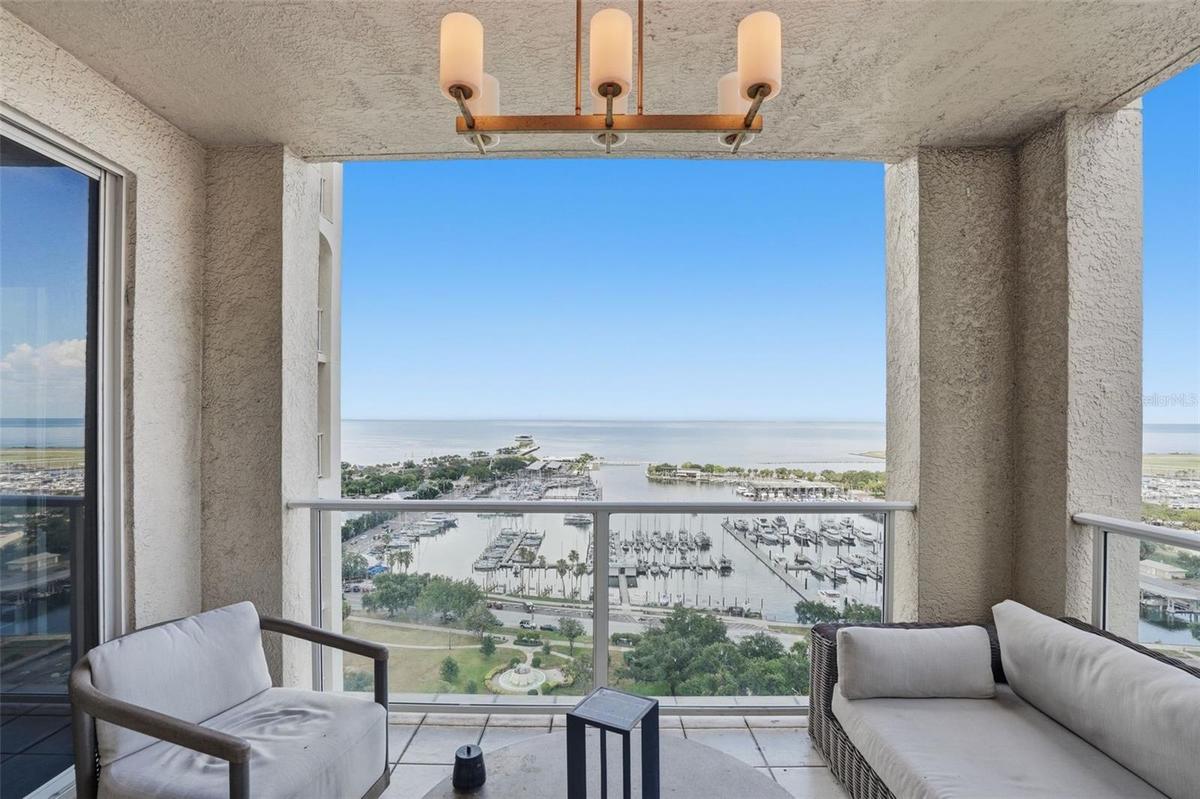 Enjoy the view of Tampa Bay, the Marina and South Straub Park from one of four balconies here at residence 1900 in The Florencia condominium