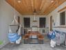 Beautiful entertaining space with custom wood ceiling