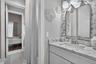 Jack and Jill bath between two downstairs guest rooms