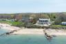 Bird's eye view with a wooded view and a water view