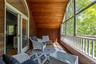 Enclosed balcony off of primary