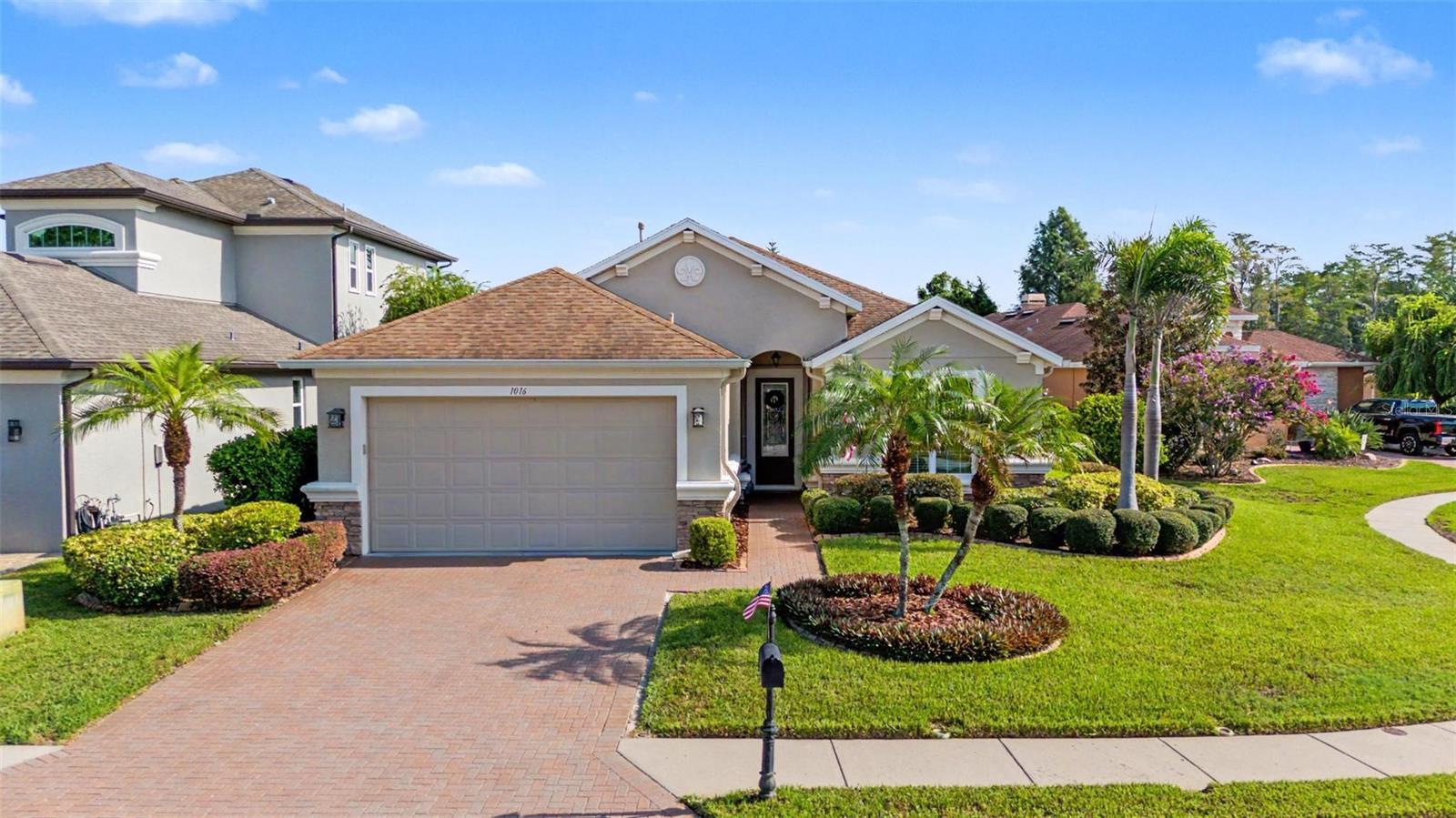 Great curb appeal with brick driveway