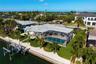 Situated on an 11,543 square foot lot with 100 feet of waterfrontage