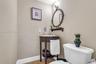 Powder bathroom same level as kitchen, dining room and family room