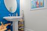 Coastal inspired half bath.