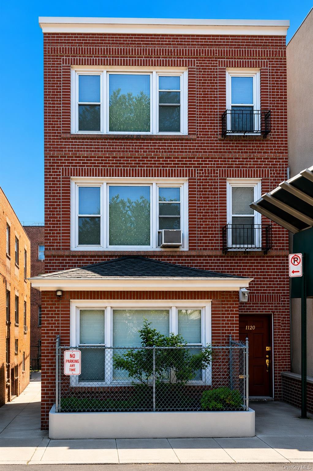 Beautiful all brick 3 story front of property
