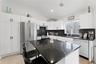 Kitchen with Island & Stainless Steel Appliances