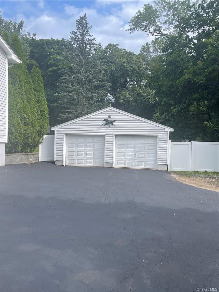 Fully fenced backyard and additional 2 car garage