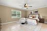 The spacious Primary Suite offers a peaceful escape with a generous walk-in closet and a beautifully appointed EN SUITE BATH.