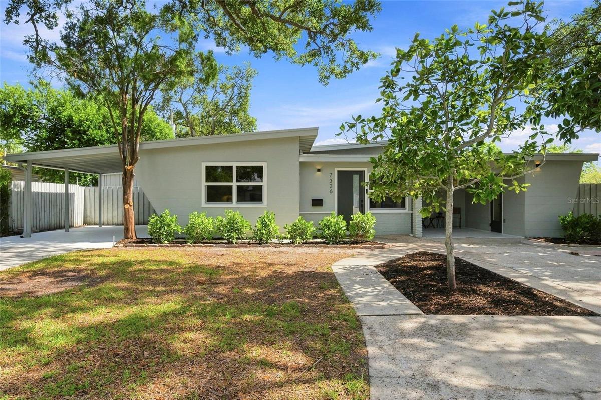 Welcome to 7326 11th Avenue N, a stunning Mid-Century Modern home located in the desirable Azalea neighborhood.