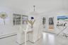 Dining space with light wood-style floors and a baseboard radiator