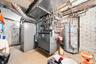 Mechanical Room – Dedicated utility room housing the home's HVAC system, water heater, and mechanical equipment. The organized layout offers convenien