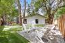 View of the side yard. Paver Seating Area.