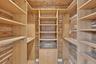 Primary Bedroom Walk in Custom Closet