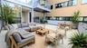 View of patio featuring an outdoor living space and outdoor dining area