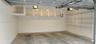 Enclosed two car garage plus storage space