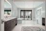 The spa-inspired primary bathroom is a true retreat!