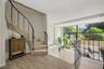 The open-concept first-floor layout offers an effortless flow for both relaxed everyday living and entertaining, while the bedrooms are privately posi