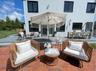 View of patio / terrace with outdoor dining area and an outdoor living space