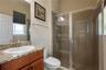 Pool bath with a linen closet off the hallway.