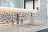 The faucets are sleek and modern!