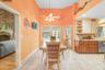 Ceramic tile throughout kitchen with pot shelves