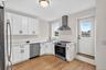 Main level - upper unit. Private balcony