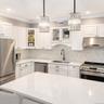 Kitchen featuring Granite countertops Granite Island and Stainless-Steel appliances