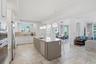 Spacious kitchen connected seamlessly to the main living areas.