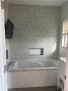 You'll be amazed at this large, whirlpool tub! Settle into a nice warm bath, while you watch your favorite tv shows!