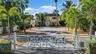 Enter your beachfront property through a custom remote gate, offering further privacy.