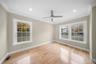 Spare room with ornamental molding, light wood finished floors, recessed lighting, and a ceiling fan
