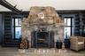 Detailed view of a fireplace, wood finished floors, and rustic walls
