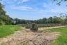 View of yard with a rural view