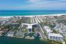 Aerial rear view of Harbor Towers & Marina