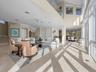 Double height, all glass paneled water views