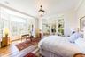 First Floor Master Bedroom with with French doors to bluestone terrace and pool