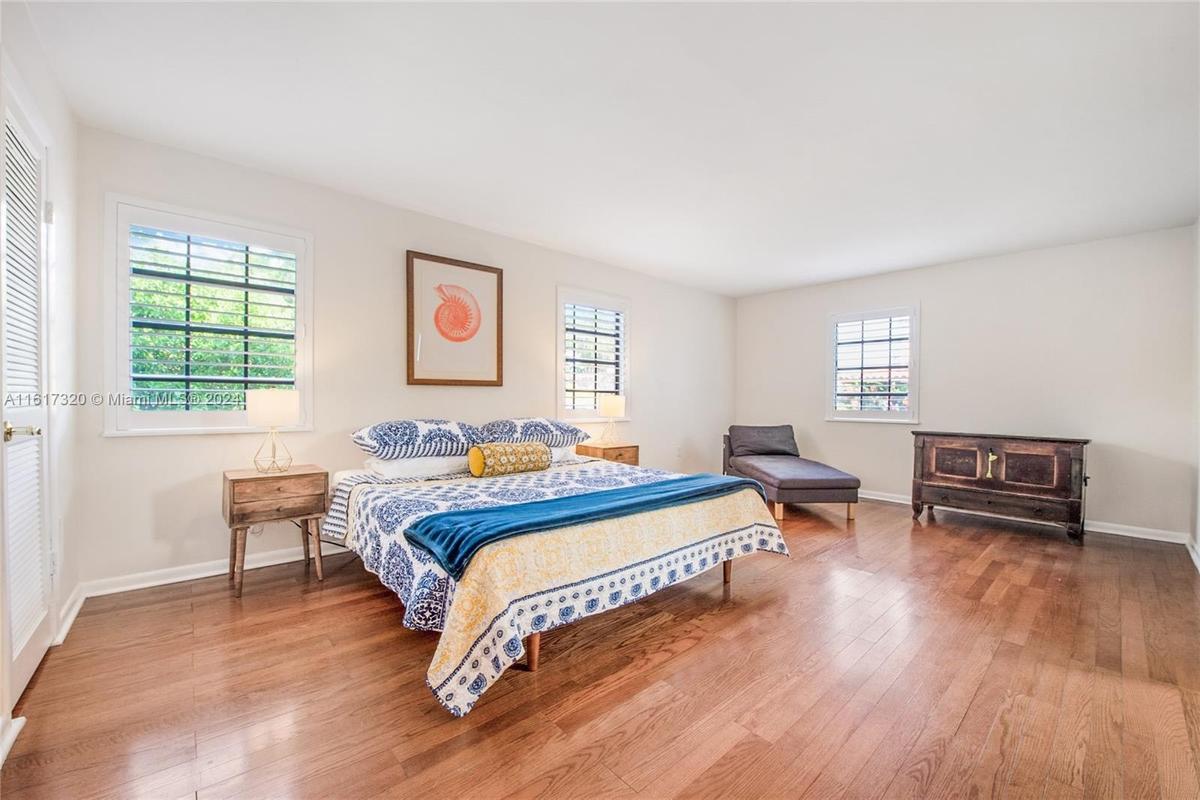Large living room with access to balcony and patio.
