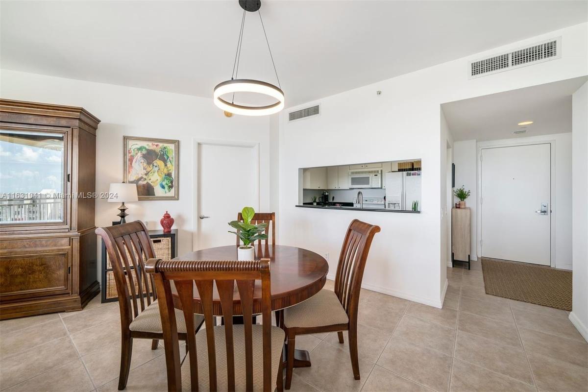 Dining and Foyer Entry at Right