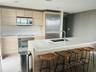 Kitchen - Quartz Countertop, wood cabinets, fine Liebherr appliances build.com