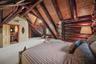 Bedroom with private bath and views of the property on two sides of the room