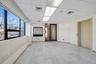 Empty room with a drop ceiling