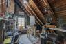 Attic accessed by upper units