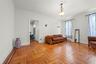 Sitting room featuring baseboards