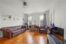 Living room with baseboards and ornamental molding
