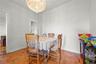 Dining room with a chandelier and baseboards