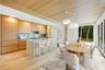 Virtual Kitchen & dining area with light wood-style floors and recessed lighting