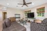 Living area featuring a ceiling fan, wood finished floors, and recessed lighting