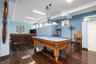 Playroom featuring wood-type flooring and pool table